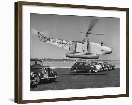 Igor Sikorsky Taking Off in Helicopter from Parking Lot-Dmitri Kessel-Framed Premium Photographic Print