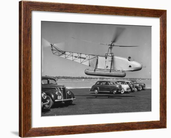 Igor Sikorsky Taking Off in Helicopter from Parking Lot-Dmitri Kessel-Framed Premium Photographic Print