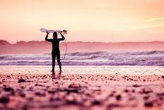 Female Surfer on the Beach at the Sunset-iko-Photographic Print