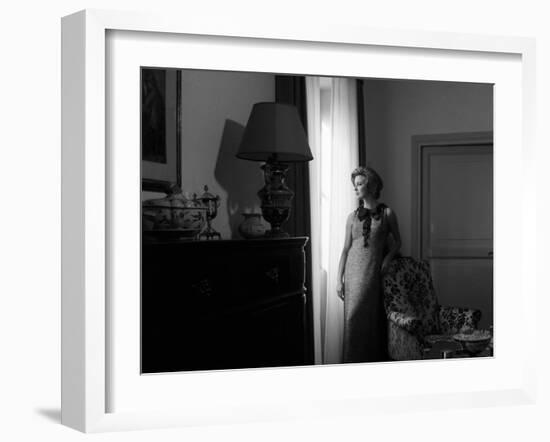 Ilaria Occhini Looks Out of the Window, in the Sitting Room of Her Flat-Marisa Rastellini-Framed Photographic Print