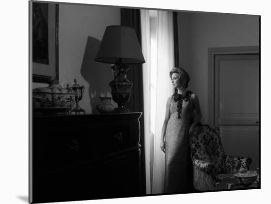 Ilaria Occhini Looks Out of the Window, in the Sitting Room of Her Flat-Marisa Rastellini-Mounted Photographic Print