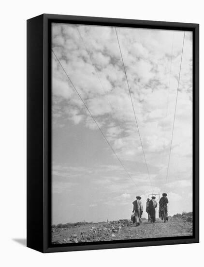 Illegal Immigrants from Mexico Following Power Lines North Into Us-Loomis Dean-Framed Premier Image Canvas