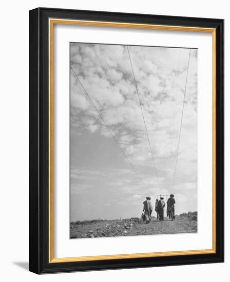 Illegal Immigrants from Mexico Following Power Lines North Into Us-Loomis Dean-Framed Photographic Print