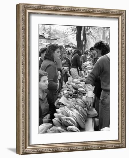 Illegal White Bread For Sale in Black Market-Alfred Eisenstaedt-Framed Photographic Print