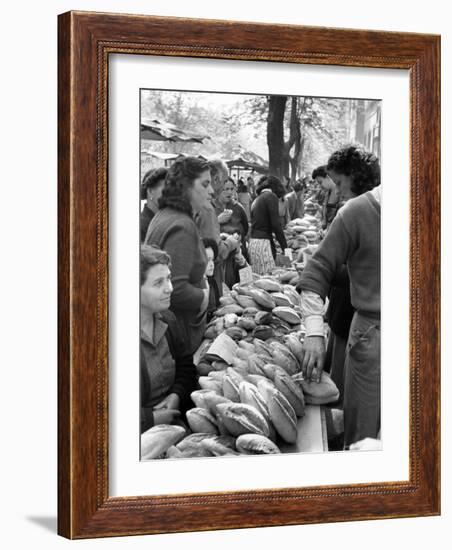 Illegal White Bread For Sale in Black Market-Alfred Eisenstaedt-Framed Photographic Print