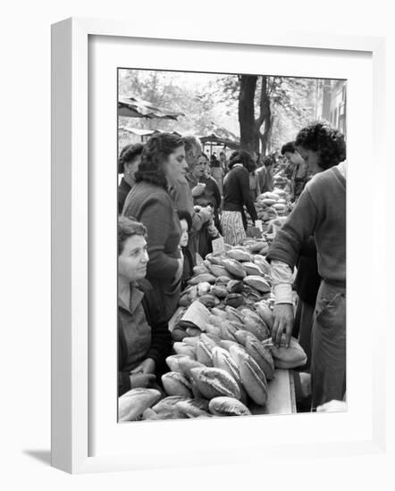 Illegal White Bread For Sale in Black Market-Alfred Eisenstaedt-Framed Photographic Print