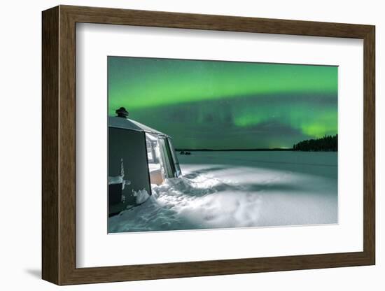 Illuminated empty igloo in the frozen landscape under Aurora Borealis (Northern Lights)-Roberto Moiola-Framed Photographic Print