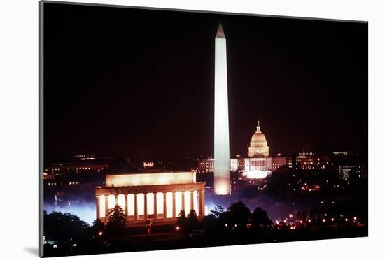 Illuminated Lincoln Memorial, Washington Monument, and US Capitol, Jan 18, 1989-null-Mounted Photo