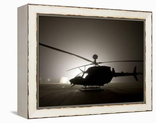 Illumination from the Bright Light Silhouettes of OH-58D Kiowa Helicopter During Thick Fog-Stocktrek Images-Framed Premier Image Canvas