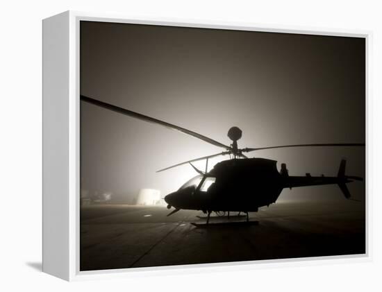 Illumination from the Bright Light Silhouettes of OH-58D Kiowa Helicopter During Thick Fog-Stocktrek Images-Framed Premier Image Canvas