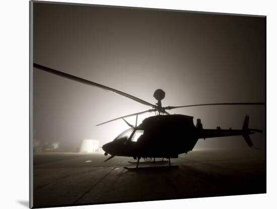 Illumination from the Bright Light Silhouettes of OH-58D Kiowa Helicopter During Thick Fog-Stocktrek Images-Mounted Photographic Print
