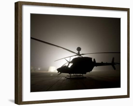 Illumination from the Bright Light Silhouettes of OH-58D Kiowa Helicopter During Thick Fog-Stocktrek Images-Framed Photographic Print