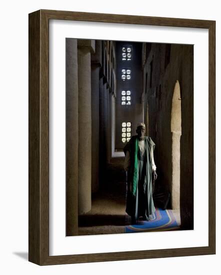 Imam of Kotaka Pauses Beside an Archway Inside the Impressive Mosque on Banks of Niger River, Mali-Nigel Pavitt-Framed Photographic Print