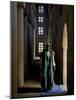 Imam of Kotaka Pauses Beside an Archway Inside the Impressive Mosque on Banks of Niger River, Mali-Nigel Pavitt-Mounted Photographic Print