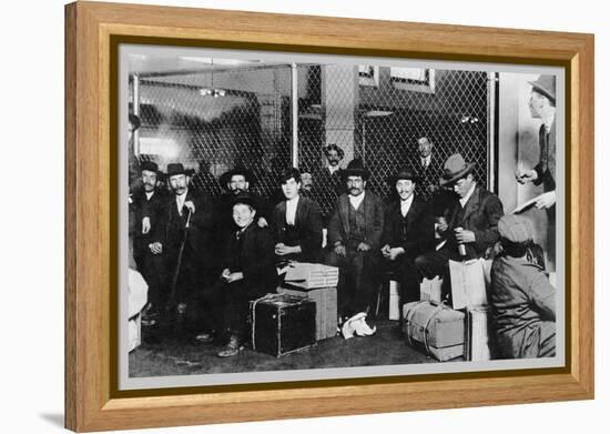 Immigrant Men Sitting at Ellis Island-null-Framed Stretched Canvas