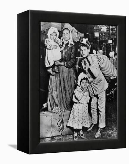 Immigrants Arriving at Ellis Island in the Early 20Th Century (B/W Photo)-Lewis Wickes Hine-Framed Premier Image Canvas