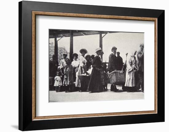 Immigrants arriving at Ellis Island, New York City, USA, c1905-Unknown-Framed Photographic Print