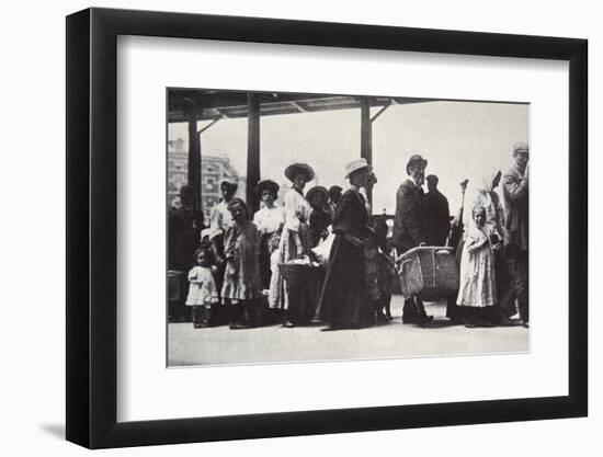 Immigrants arriving at Ellis Island, New York City, USA, c1905-Unknown-Framed Photographic Print