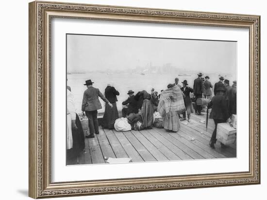 Immigrants Waiting for Ferry from Ellis Island to New York City, Oct. 20, 1912-null-Framed Photo