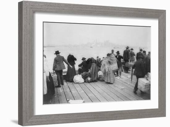 Immigrants Waiting for Ferry from Ellis Island to New York City, Oct. 20, 1912-null-Framed Photo