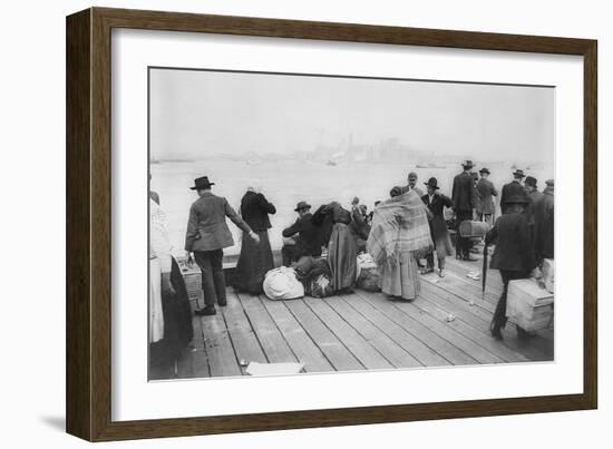 Immigrants Waiting for Ferry from Ellis Island to New York City, Oct. 20, 1912-null-Framed Photo