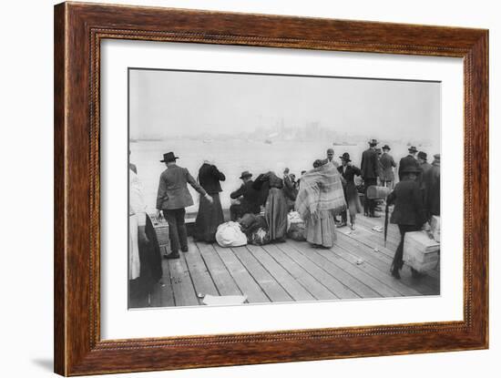 Immigrants Waiting for Ferry from Ellis Island to New York City, Oct. 20, 1912-null-Framed Photo