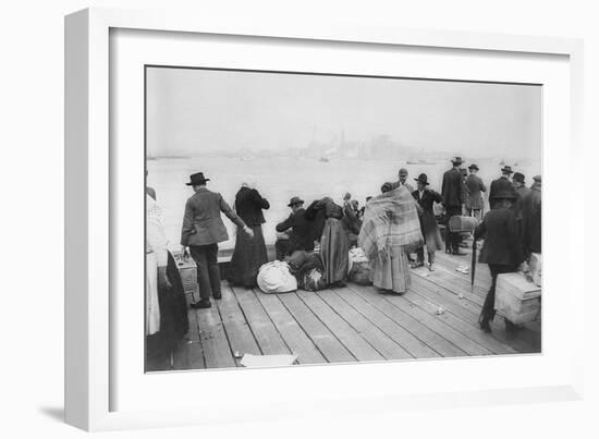 Immigrants Waiting for Ferry from Ellis Island to New York City, Oct. 20, 1912-null-Framed Photo