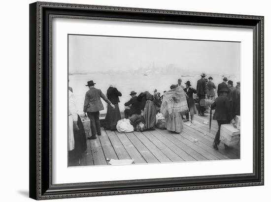 Immigrants Waiting for Ferry from Ellis Island to New York City, Oct. 20, 1912-null-Framed Photo