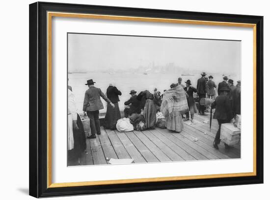 Immigrants Waiting for Ferry from Ellis Island to New York City, Oct. 20, 1912-null-Framed Photo