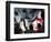 Immigration Rights Demonstrators Hold a U.S. Flag Aloft During a March Along Wilshire Boulevard-null-Framed Photographic Print