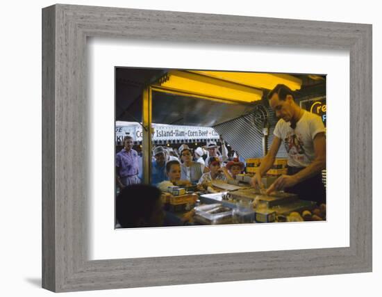 In a Booth at the Iowa State Fair, a Man Demonstrates 'Feemsters Famous Vegetable Slicer', 1955-John Dominis-Framed Photographic Print