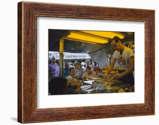 In a Booth at the Iowa State Fair, a Man Demonstrates 'Feemsters Famous Vegetable Slicer', 1955-John Dominis-Framed Photographic Print