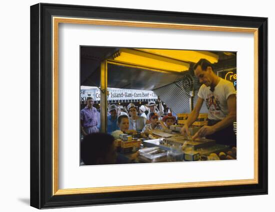 In a Booth at the Iowa State Fair, a Man Demonstrates 'Feemsters Famous Vegetable Slicer', 1955-John Dominis-Framed Photographic Print