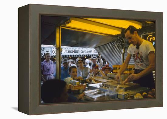 In a Booth at the Iowa State Fair, a Man Demonstrates 'Feemsters Famous Vegetable Slicer', 1955-John Dominis-Framed Premier Image Canvas