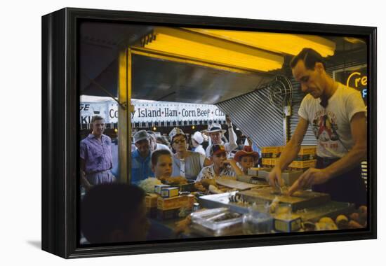 In a Booth at the Iowa State Fair, a Man Demonstrates 'Feemsters Famous Vegetable Slicer', 1955-John Dominis-Framed Premier Image Canvas