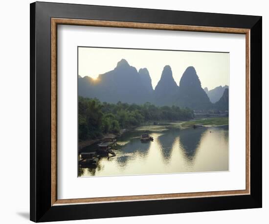 In Guilin Limestone Tower Hills Rise Steeply Above the Li River, Yangshuo, Guangxi Province, China-Anthony Waltham-Framed Photographic Print