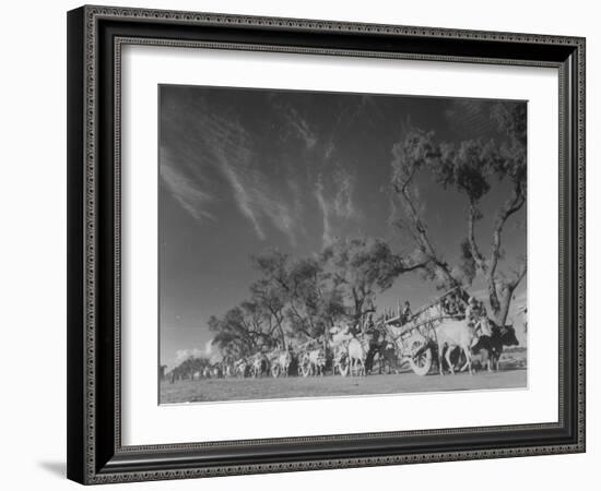 In Heavy-Wheeled Carts, Refugees Making their Way to India-Margaret Bourke-White-Framed Photographic Print