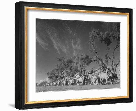 In Heavy-Wheeled Carts, Refugees Making their Way to India-Margaret Bourke-White-Framed Photographic Print