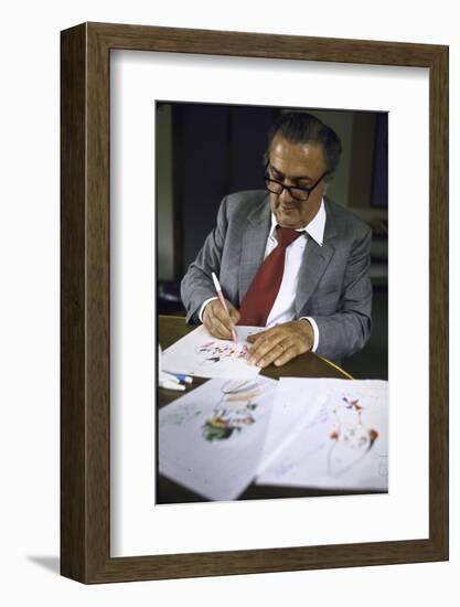 In Rome's Cinecitta Movie Center, Federico Fellini Draws for the Motion Picture "The Clowns"-Carlo Bavagnoli-Framed Photographic Print