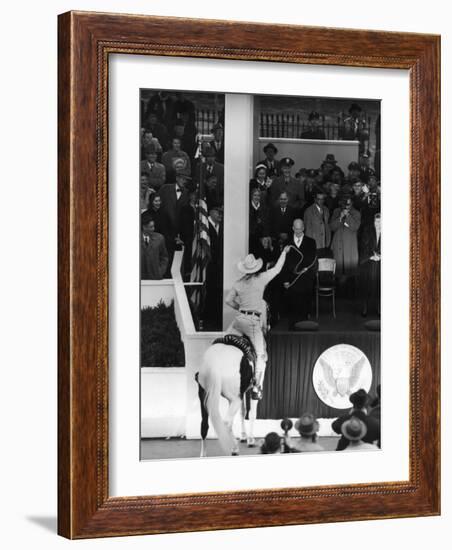 Inauguration of President Dwight Eisenhower, Approached by a Parade Cowboy who Lassoes Him-Hank Walker-Framed Photographic Print