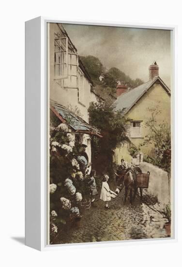 Independant Street, Clovelly, Devon-null-Framed Premier Image Canvas