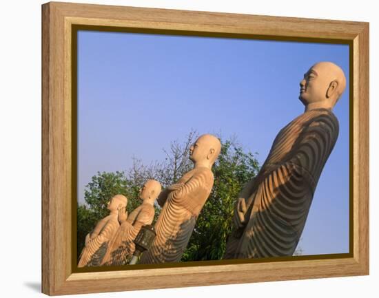 India, Bihar, Bodh Gaya (Aka Bodhgaya), Statues of Bodhisattvas, or 'Enlightened Beings', Garden in-Amar Grover-Framed Premier Image Canvas