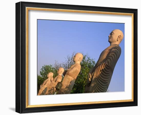 India, Bihar, Bodh Gaya (Aka Bodhgaya), Statues of Bodhisattvas, or 'Enlightened Beings', Garden in-Amar Grover-Framed Photographic Print