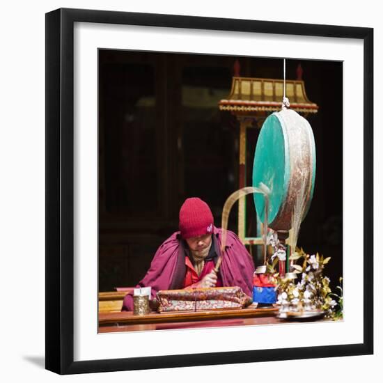 India, Ladakh, Hemis, Monk Reciting Prayers to the Slow Rhythm of a Drum at Hemis Monastery-Katie Garrod-Framed Photographic Print