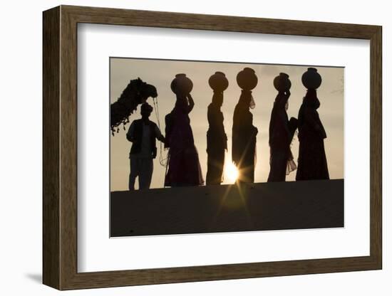 India, Manvar, Desert, Sand Dunes. Colorfully Dressed Women Walking with Pots on their Head-Emily Wilson-Framed Photographic Print