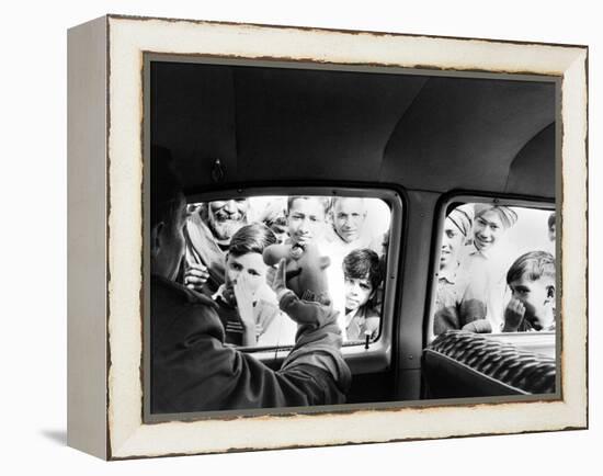 Indian children looking into puppeteer Bil Baird's car, March 1962.-James Burke-Framed Premier Image Canvas