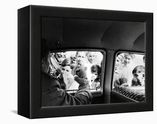 Indian children looking into puppeteer Bil Baird's car, March 1962.-James Burke-Framed Premier Image Canvas