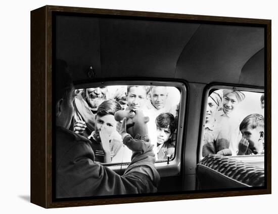 Indian children looking into puppeteer Bil Baird's car, March 1962.-James Burke-Framed Premier Image Canvas