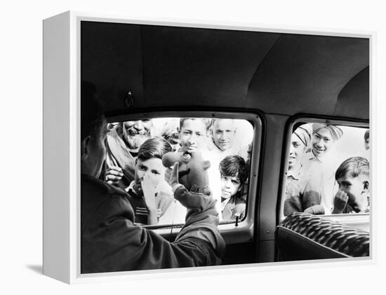 Indian children looking into puppeteer Bil Baird's car, March 1962.-James Burke-Framed Premier Image Canvas