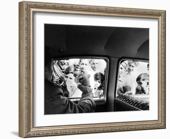 Indian children looking into puppeteer Bil Baird's car, March 1962.-James Burke-Framed Premium Photographic Print